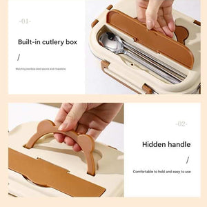 2 Grids 316 Stainless Steel lunch box with cream and tan bear lid, showing a built-in cutlery compartment and hidden carry handle