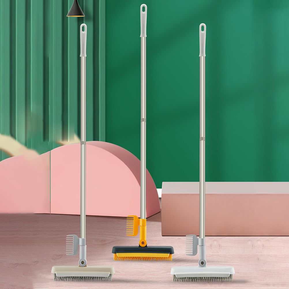 2 in 1 Floor Brush with a long silver metal handle and a wide rectangular head with pale bristles and orange scraper