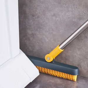 2 in 1 Floor Brush with dark teal angled head, dense orange bristles, and a stainless steel handle joint