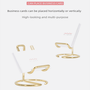 2-Pack Black Universal Aluminum Phone Stand design shown as a gold-toned metal stand with a circular base and raised phone rest