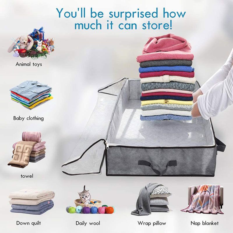 2 Pack Folding Non-Woven storage containers in dark grey fabric with clear zippered lids and reinforced handles, holding folded clothes