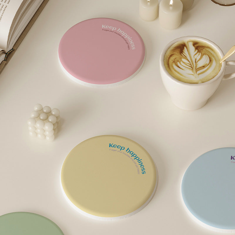 2 Pcs Blue Quick-Dry coaster set featuring a pale blue round mat with a smooth surface and printed lettering