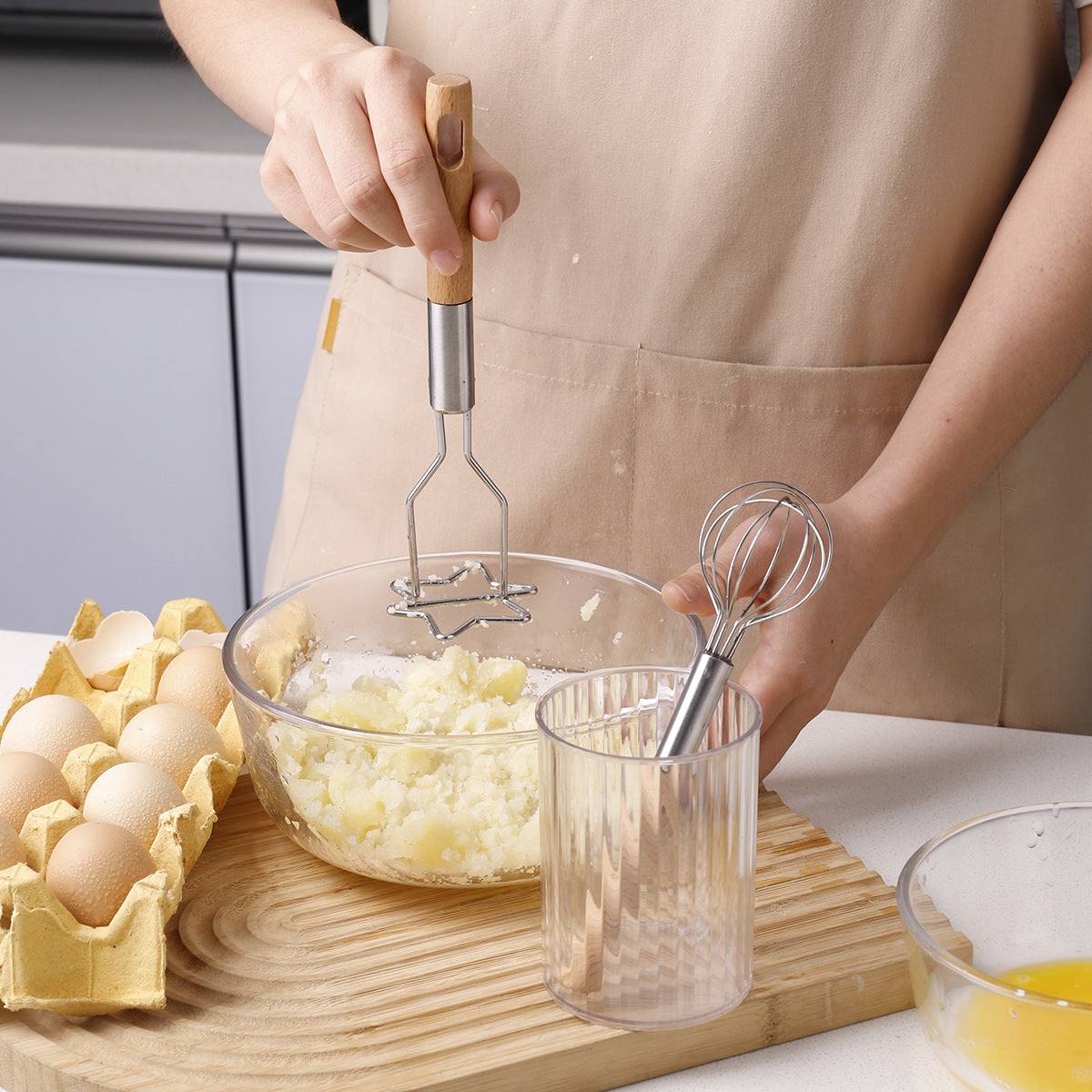 2-Piece Kitchen Tool Set with stainless steel whisk and masher, featuring natural wood handles and star-shaped head