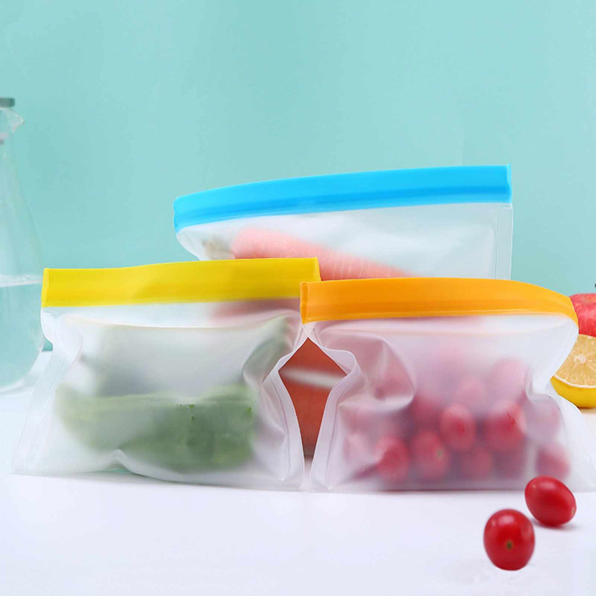 20PCS Reusable Ziplock Bags in translucent flexible plastic with blue, yellow and orange double zipper seals, holding fruit