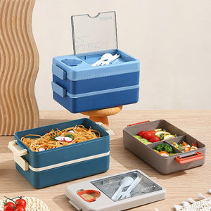 2L Double-Layer Bento Lunch Box in blue plastic with stacked tiers, clear lid, locking clasps and white utensils