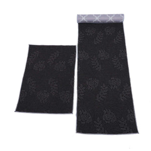 2Pcs Kitchen Mat set in charcoal polyester, featuring two sizes with a subtle raised floral pattern and grey borders