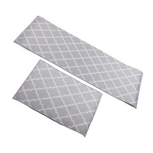 2Pcs Kitchen Mat set in grey polyester with a white repeating quatrefoil pattern, featuring one long and one rectangular rug