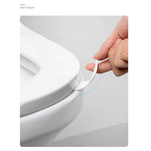 2Pcs Toilet Lid Lifter in white soft TPR, with a curved handle attached beneath a toilet seat for hygienic lifting