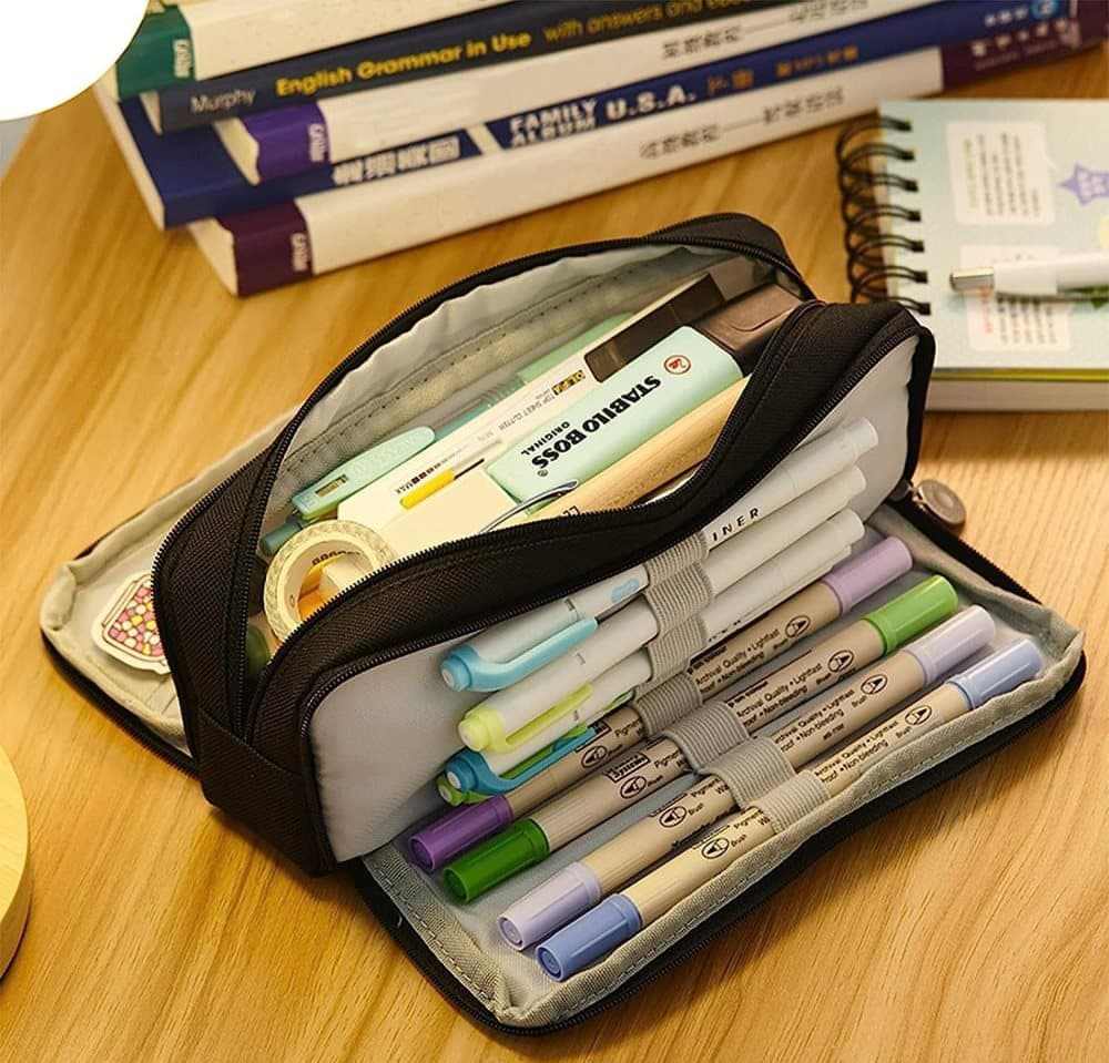 3 Compartment Pencil Case in black fabric with multiple zippered sections, elastic pen holders and colourful stationery