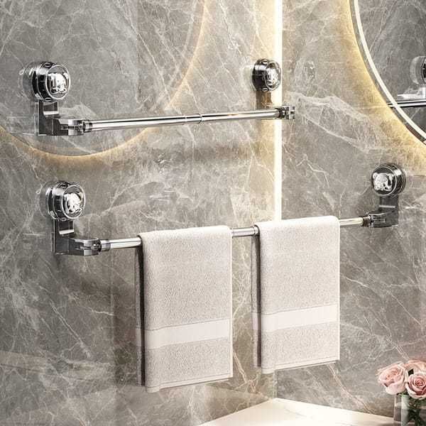 30–60 cm extendable towel rail with chrome-finish rods, round suction cup mounts and two white towels hanging below