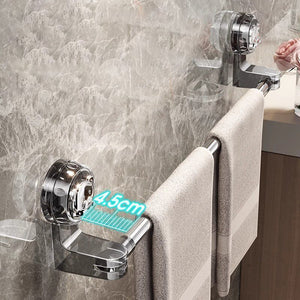 30–60 cm extendable towel rail with a polished silver metal bar, clear suction cups and towels hanging 4.5 cm from the wall