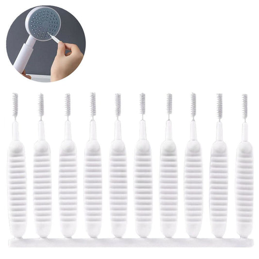 30Pcs Shower Nozzle Cleaning Brush with white ribbed plastic handles and fine nylon bristles, shown clearing showerhead holes