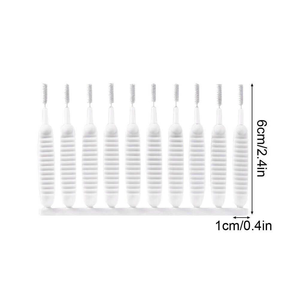 30Pcs Shower Nozzle Cleaning Brush set with white ribbed plastic handles and fine nylon bristle tips, about 6 cm long