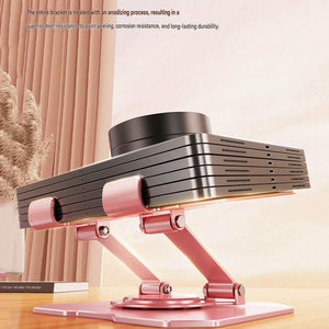 360 Degree Rotating Tablet stand in rose gold metal with a dual-arm base supporting a wide black device cradle