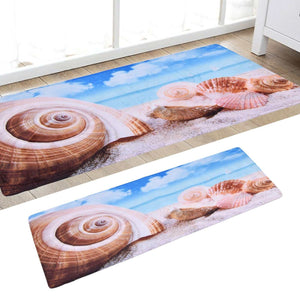 3D Pattern Doormat in soft flannel with a beach scene, blue sky, sandy shore and detailed seashells