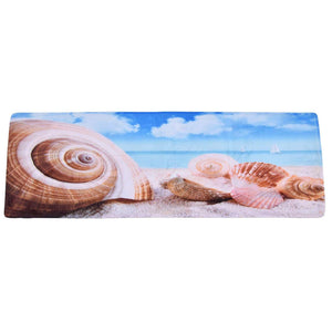 3D Pattern Doormat in soft flannel with a colorful beach scene, showing seashells, blue sea, sky and sand