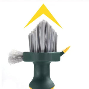 4-in-1 Grout Brush in dark green with gray V-shaped bristles, side brush head and yellow squeegee tip