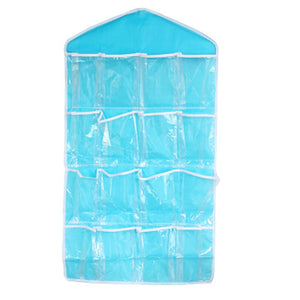 4 Pack Blue Hanging Closet Organizer with a bright blue fabric backing, clear plastic pockets, and white trim.