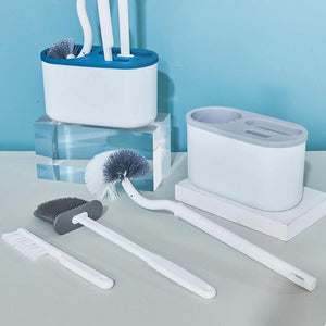 4 Pieces Toilet Bowl Brush Set in white plastic, with a wall-mounted holder and three distinct brush heads for cleaning