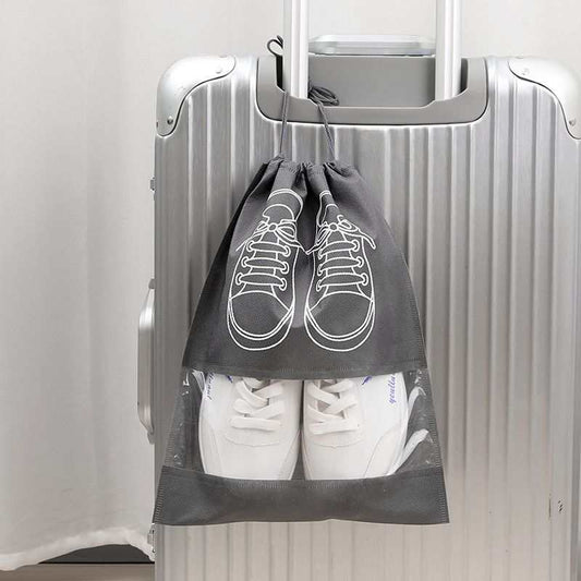 50-Pack Shoe Storage Bags include a charcoal non-woven drawstring pouch with white sneaker outlines and a clear window showing white shoes