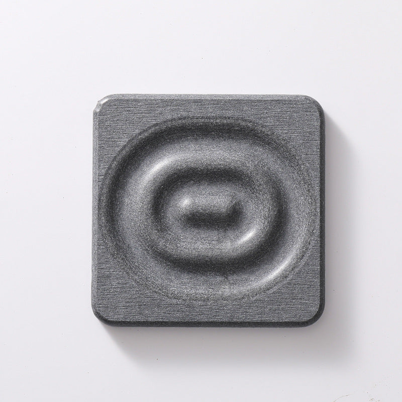 Square dark grey diatomite coaster with a textured stone surface and raised circular centre, 6-Pack Dark Grey Instant Dry