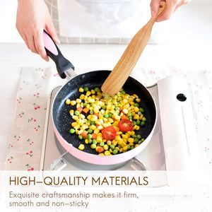 6 Pcs Wooden Spurtle Set with a natural wood spatula stirring colorful vegetables in a pink pan