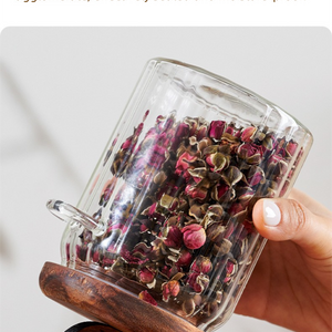 600ml Premium Borosilicate Glass storage jar with clear cylindrical body, wood-toned lid and visible dried flowers inside