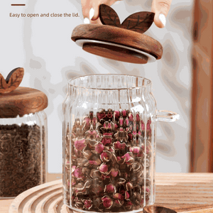 600ml Premium Borosilicate Glass jar with clear cylindrical body, filled with dried rosebuds and a wooden lid with knob