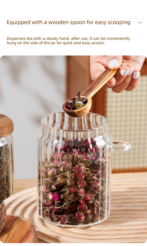 600ml Premium Borosilicate Glass jar with a clear ribbed body, side handle and matching wooden spoon scooping dried rosebuds
