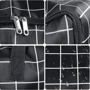 75L Large Storage Bags in black Oxford cloth with a white grid pattern, dual zippers, reinforced webbing handles and water-resistant surface
