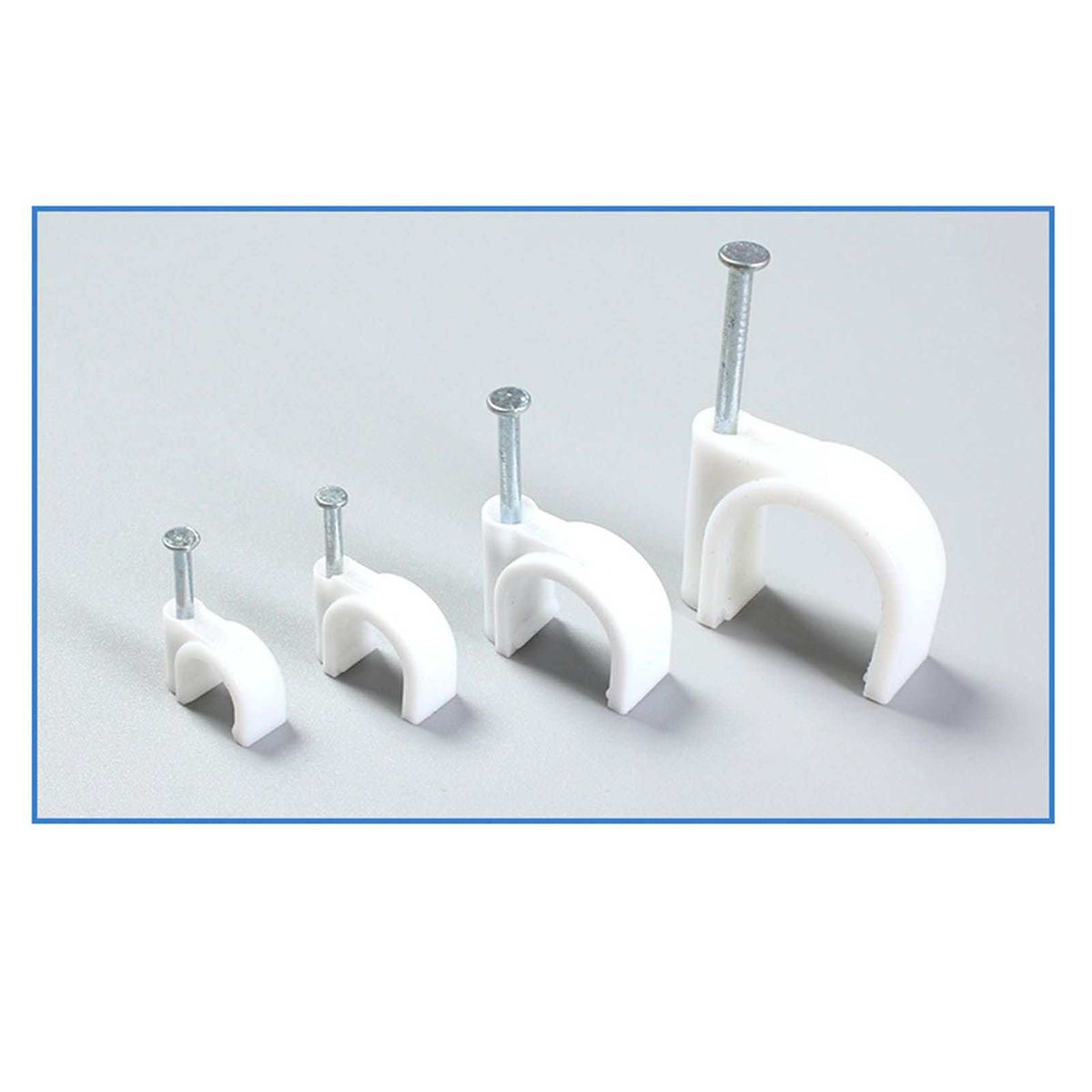 Steel Nail Cable Fixing Clips in white plastic with silver steel nails, shown in four graduated sizes with arched cable holders