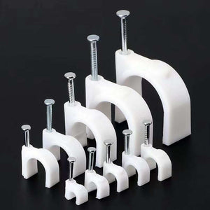 Steel Nail Cable Fixing Clips in white plastic with shiny steel nails, shown in several sizes with arched snap-fit holders