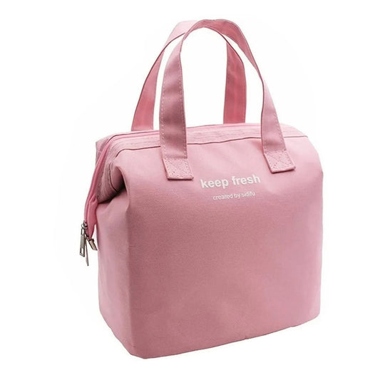 Insulated Lunch Bag in dusty pink fabric with twin handles, side zipper, and a simple boxy shape.