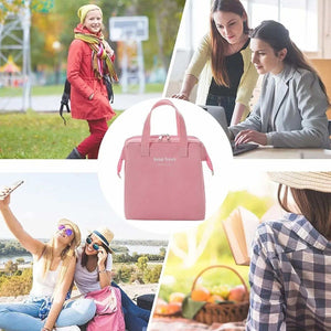 Insulated Lunch Bag in pink with a structured rectangular shape, dual handles, front pocket and metal zipper