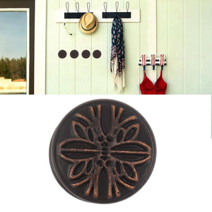 Bathroom Towel Hook Copper shown as a round dark bronze wall hook with raised floral detailing and a decorative edge