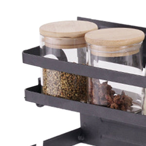 Refrigerator Magnetic Storage Shelf in black metal, double-tiered with jars and wooden lids, holding spices on refrigerator side