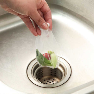 200 Pcs Sink Strainer Bag is a fine white polyester mesh bag holding food scraps above a metal drain