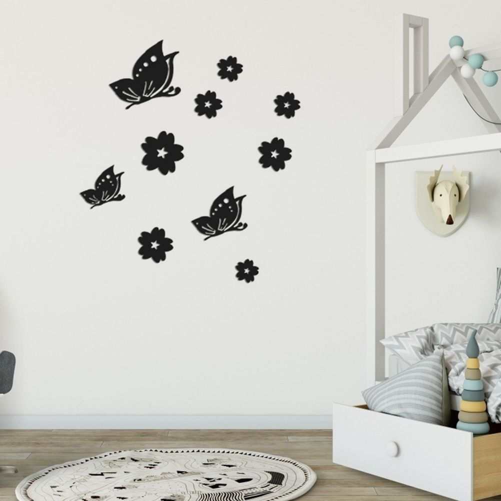 3D Mirror Wall Sticker set in black butterfly and flower shapes, with decorative cutout details and reflective acrylic