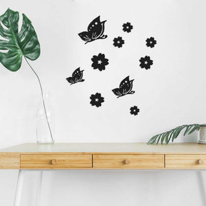 3D Mirror Wall Sticker set in black, with butterfly silhouettes and varied flower shapes in a decorative arrangement