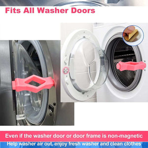 Front Load Washer Door Prop in bright pink silicone with a hollow mouth-shaped design holding front-load washer doors open