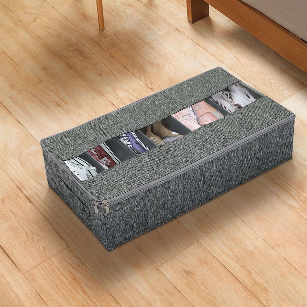 Under-bed shoe organiser in grey Washable Cotton Linen with a zippered lid, clear window and visible shoe compartments.