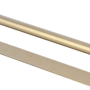 Single Rod Towel Bar in brushed gold metal, featuring a slim cylindrical rail and a flat mounting strip