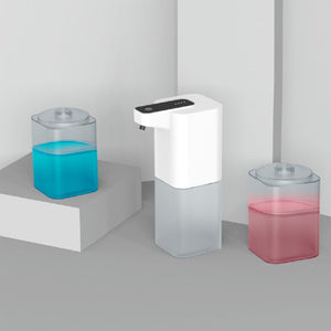 Infrared Automatic Sensor soap dispenser with a white plastic body, black control panel and clear refill bottles in blue and pink