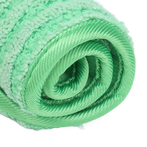 Mop Pad Microfiber in mint green, showing plush absorbent fabric and a textured woven backing rolled together