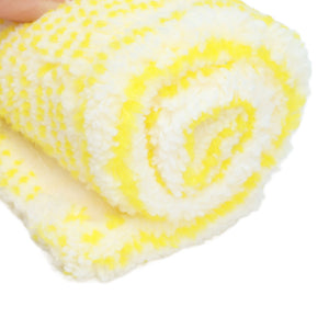 Microfiber Window Cleaner Pad in plush white microfiber with bright yellow patterned fibres, shown folded with a soft textured surface