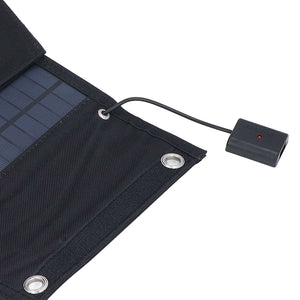 9W Solar Panel foldable charger with dark blue photovoltaic cells, black fabric casing, metal eyelets and wired USB port