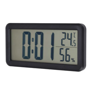 Digital Alarm Clock with a black plastic frame and LCD screen displaying the time, temperature and humidity readings