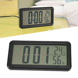 Digital Alarm Clock in a black rectangular case with a large LCD time display and smaller temperature and humidity readings