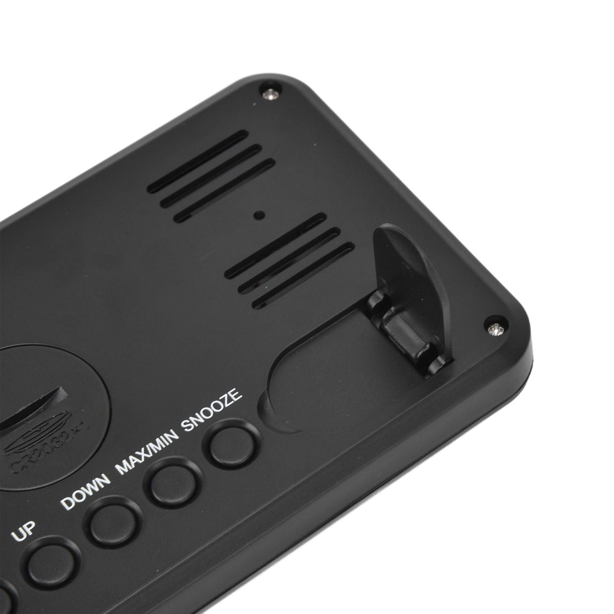 Digital Alarm Clock in black ABS plastic, showing rear controls, speaker vents, screws and a fold-out stand