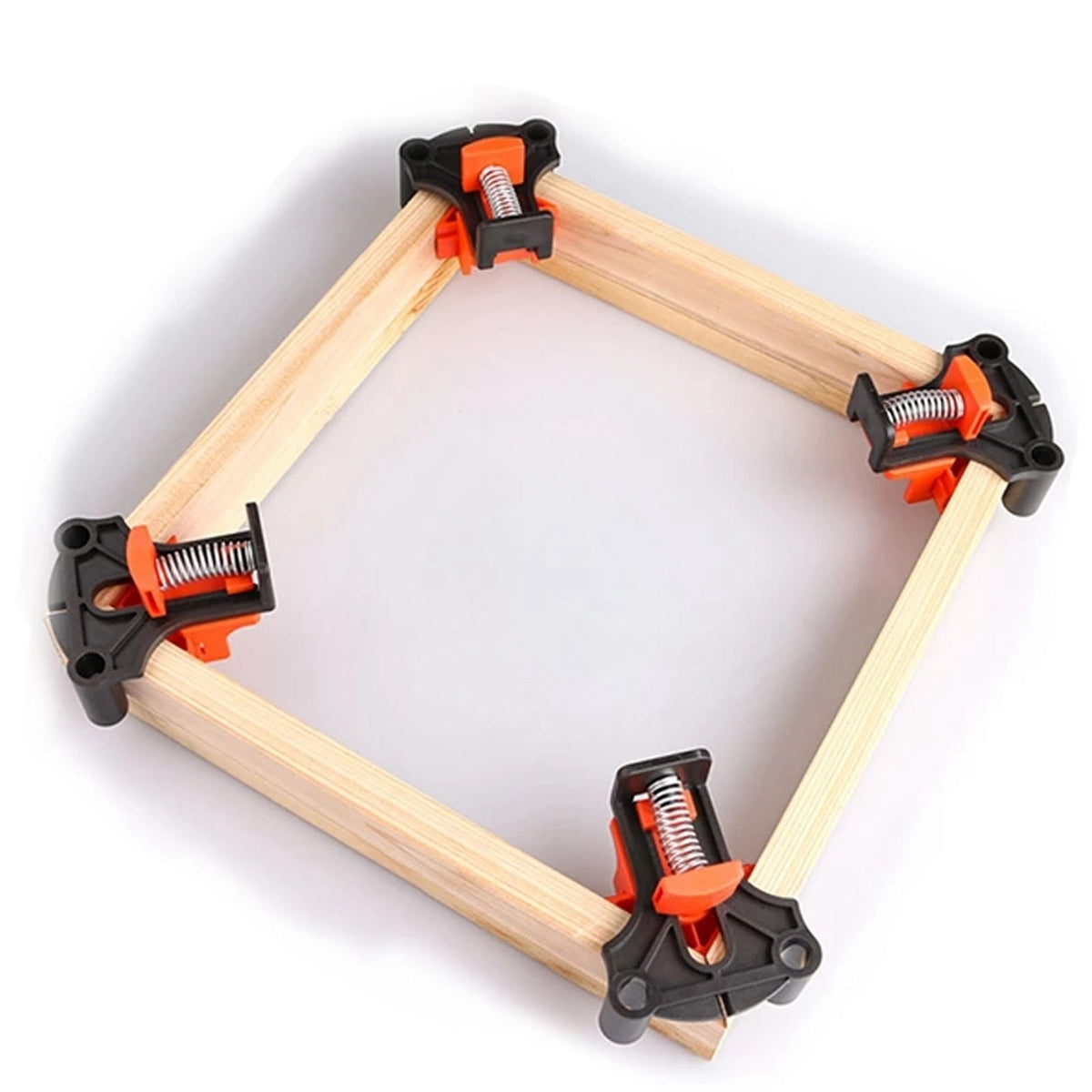 Angle Clamps in black and orange ABS plastic gripping the corners of a square wooden frame with spring-loaded jaws